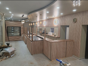 Photo de galerie - Réalisation de boulangerie avec contoire sur mesure
