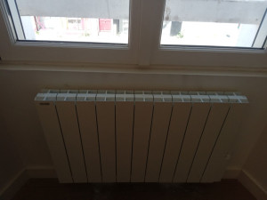 Photo de galerie - Remontage d'un radiateur qui etait tombé du mur.