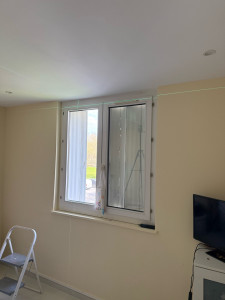 Photo de galerie - Pose tringles à rideaux 