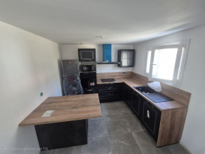 Photo de galerie - Pose cuisine, ilot,  évier, électroménager