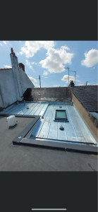 Photo de galerie - Fin de chantier rénovation d’un toit en zinc à joint débout