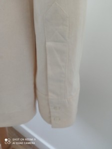 Photo de galerie - Détails : patte capucin avec poignet de chemise
