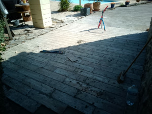 Photo de galerie - Carrelage d'une terrasse de 12m2 environ 
