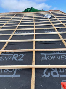 Photo de galerie - Pose de liteaux et d’écran de sous toiture 