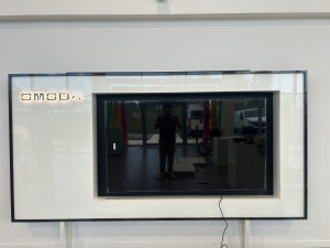 Photo de galerie - Installation chez un concessionnaire meubles + télé fixer au mur