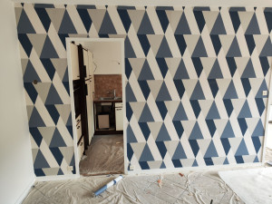 Photo de galerie - Pose papier peint