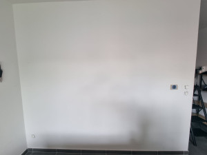 Photo de galerie - Ratissage mur et impression blanc pour pose tapisserie 

