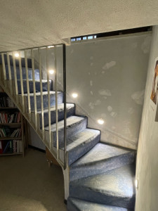 Photo de galerie - Création de 5 spots dans une rampe d’escalier avec rebouchage 