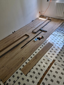 Photo de galerie - Pose sol stratifié 