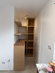 Photo de galerie - Instalation d un espace de rangement sur mesure 