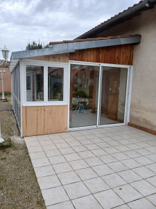 Photo de galerie - Fenêtre et bardage bois