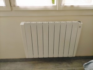 Photo de galerie - Réparation et fixation d'un radiateur sur mur en briques.
