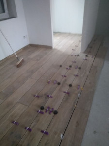 Photo de galerie - Pose carrelage effet parquet