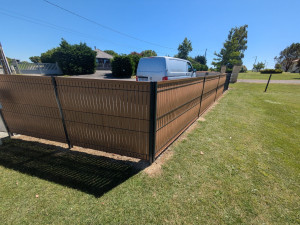 Photo de galerie - Pose d'une clôture en panneaux rigides avec occultants