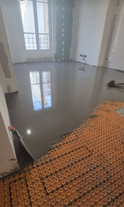 Photo de galerie - Installation de ragréage avec thermofol   