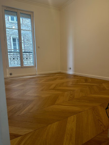 Photo de galerie - Pose de parquet massif sur isolant plus changement de fenêtre et PVC avec enduit et peinture des murs 