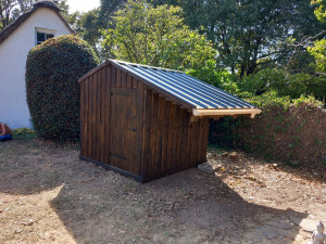 Photo de galerie - Cabane de jardin avec abri à bois 