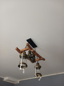 Photo de galerie - Mise en place d’un lustre de salle a manger