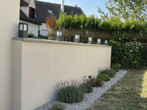 Photo de galerie - Montage mur, parpaing avec finition monocouche et installation électrique