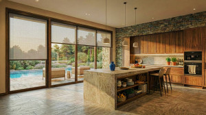 Photo de galerie - Cuisine moderne avec îlot central en pierre naturelle et meubles en bois. Grandes baies vitrées sur piscine et éclairage LED intégré. Design chaleureux alliant matériaux nobles et fonctionnalité.