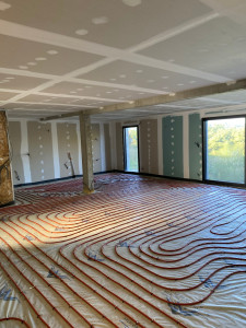 Photo de galerie - Installation d’un plancher chauffant pour un confort moderne et uniforme