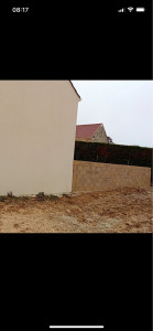 Photo de galerie - Construction d’un mur en BBM qui servira de clôture  
