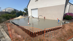 Photo de galerie - Réalisation d’une dalle pour extension 