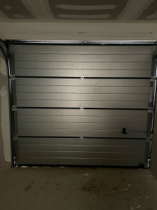 Photo de galerie - Installation d’une porte de garage sectionnelle 
