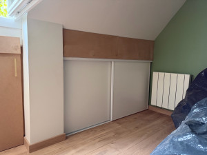 Photo de galerie - Création de rangement avec portes coulissantes 
