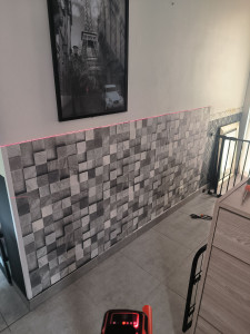 Photo de galerie - Pose de soubassement de tapisserie.