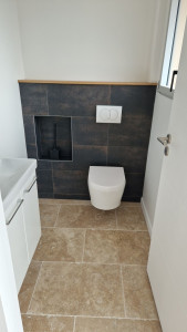 Photo de galerie - Toilettes carrelée 
