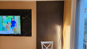 Photo de galerie - Pose de panneaux décoratifs en bois