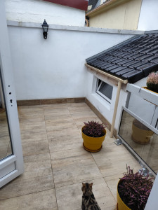 Photo de galerie - Carrelage, menuiserie, petite toiture et mur extérieur refait