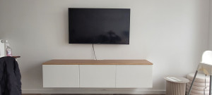 Photo de galerie - Fixation de meubles le tv au mur ainsi que la tv accrocher sur son support mural 