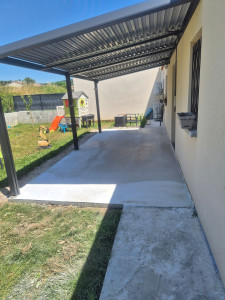 Photo de galerie - Création d'une dalle + installation pergola 