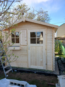 Photo de galerie - Montage d'un chalet bois