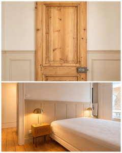 Photo de galerie - Rénovation d’une porte ancienne en bois par décapage et ponçage, avec création d’une tête de lit murale décorative en moulures et cimaise.