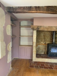 Photo de galerie - Rénovation d'un salon avec toile de verre plafond, enduit et peinture 