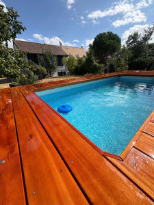 Photo de galerie - Piscine hors sol et terrasse bois exotique sur mesure