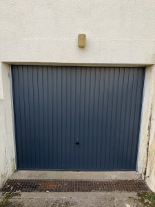 Photo de galerie - Porte de garage en rénovation, dépose et pose d’une porte de garage basculante