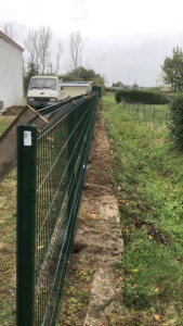 Photo de galerie - Pose d’une clôture rigide