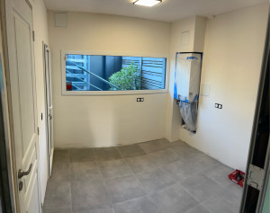 Photo de galerie - Placo et carrelage dans une buanderie 