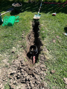 Photo de galerie -     Réalisation d’une fontaine avec passage des réseaux en tranchée.