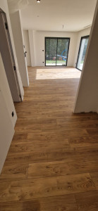 Photo de galerie - Parquet flottant 10mm dans toute la maison 