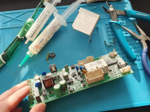 Photo de galerie - Réparation de la carte de puissance de la machine à café DeLonghi Magnifica S.