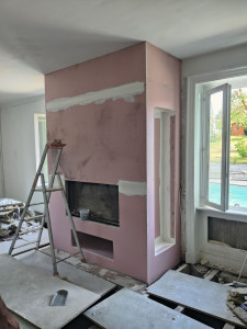 Photo de galerie - Création cheminée habillage placo avec 2 niche latérale est une niche a biche dessous le foyer 