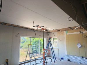 Photo de galerie - Réalisation d'un plafond BA13 avec isolation laine de verre 300mm