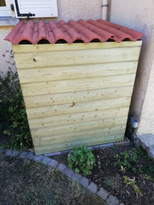 Photo de galerie - Habillage d'une cuve de récupération d'eau de pluie
