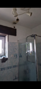 Photo de galerie - Salle de douche avant rénovation