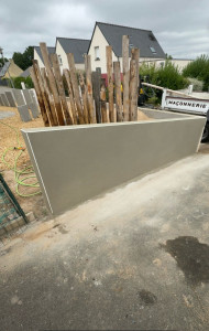 Photo de galerie - Mur en parpaing avec crépi 